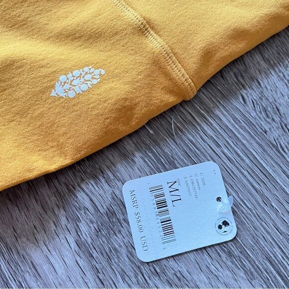 NWT Free People Blaze It Crossover Bike Shorts in Tumeric Yellow Gold M/L - Picture 4 of 6